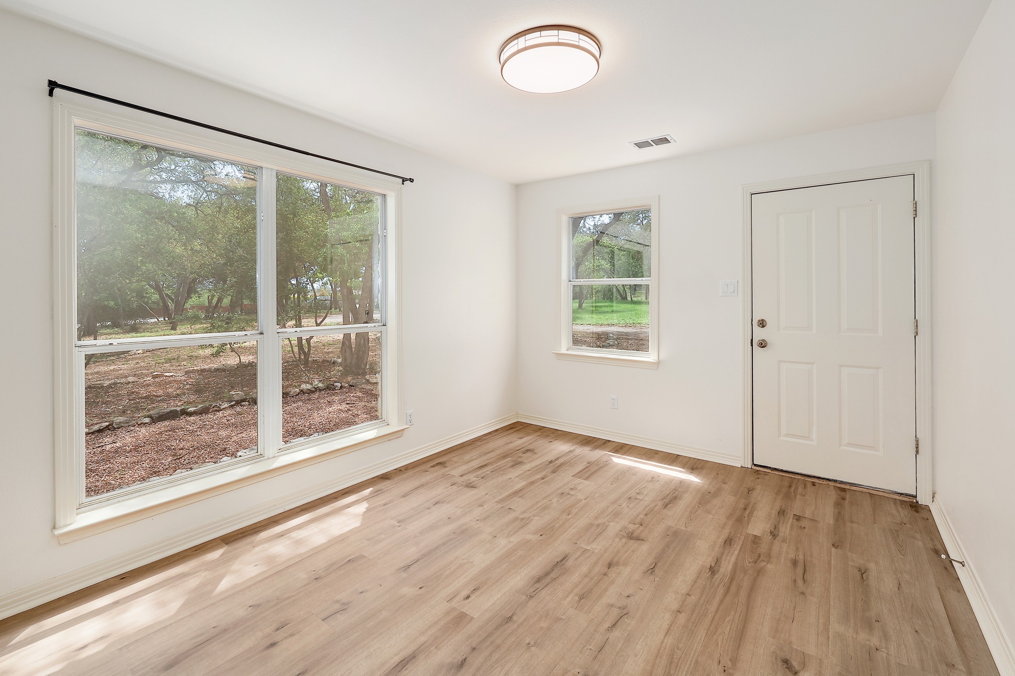 1700 Patterson Road Austin, TX 78733 - Photo 20 of 36 Designated Office with access to driveway side of the house