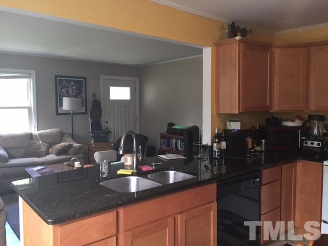 2616 Layden Street Raleigh, NC 27603 - Photo 5 of 21 Nice kitchen with newer cabinets, granite countertops and appliances
