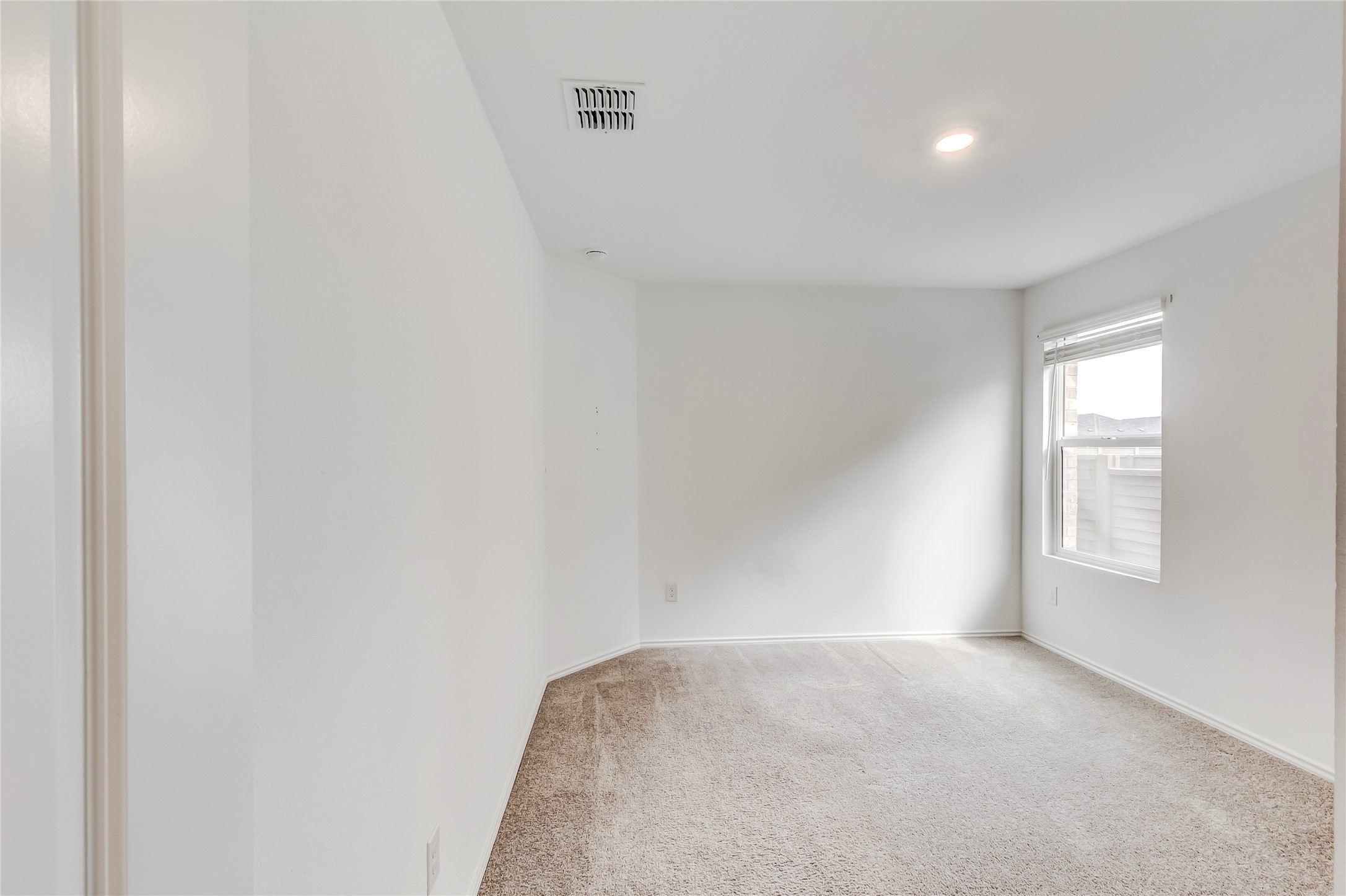 591 Avre Loop Kyle, TX 78640 - Photo 28 of 34 an empty room with windows