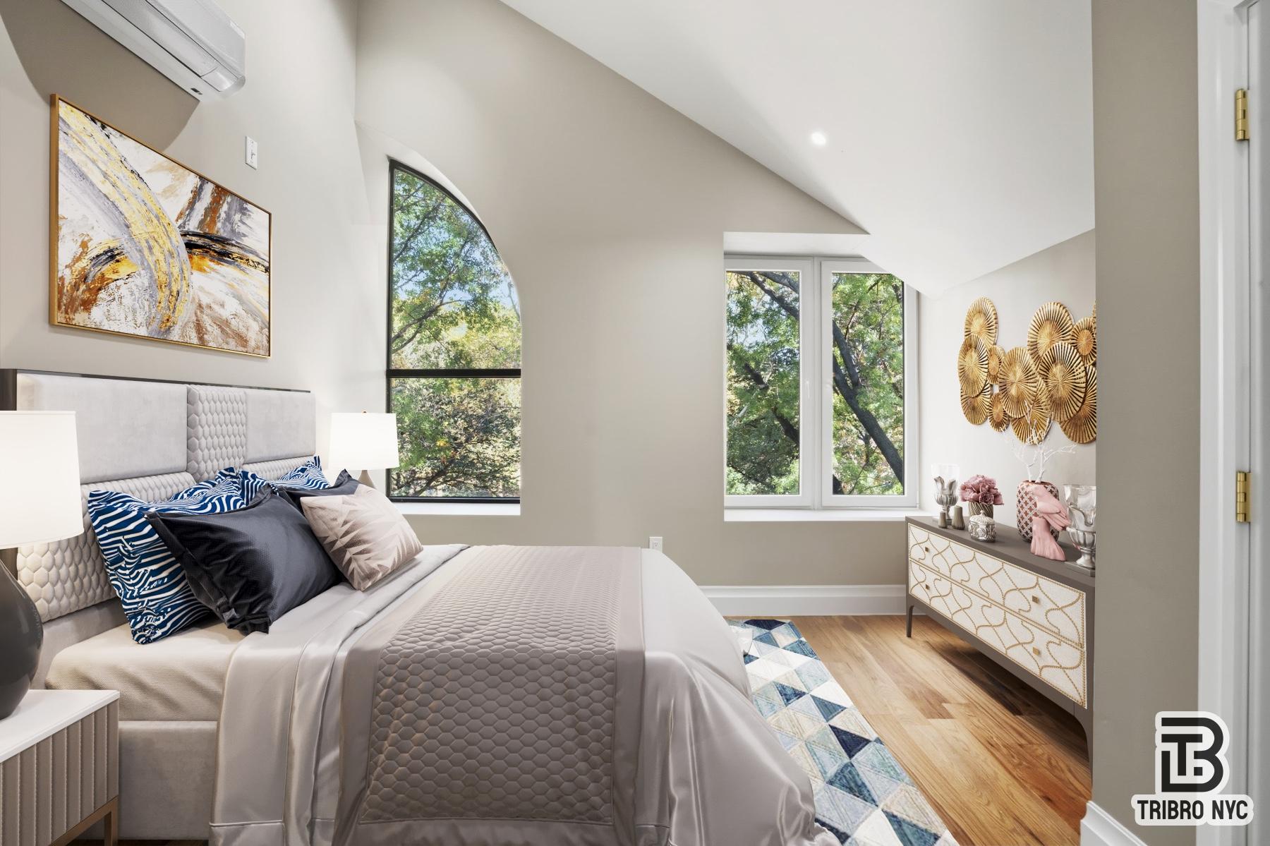 a bedroom with a bed and a window with outer view