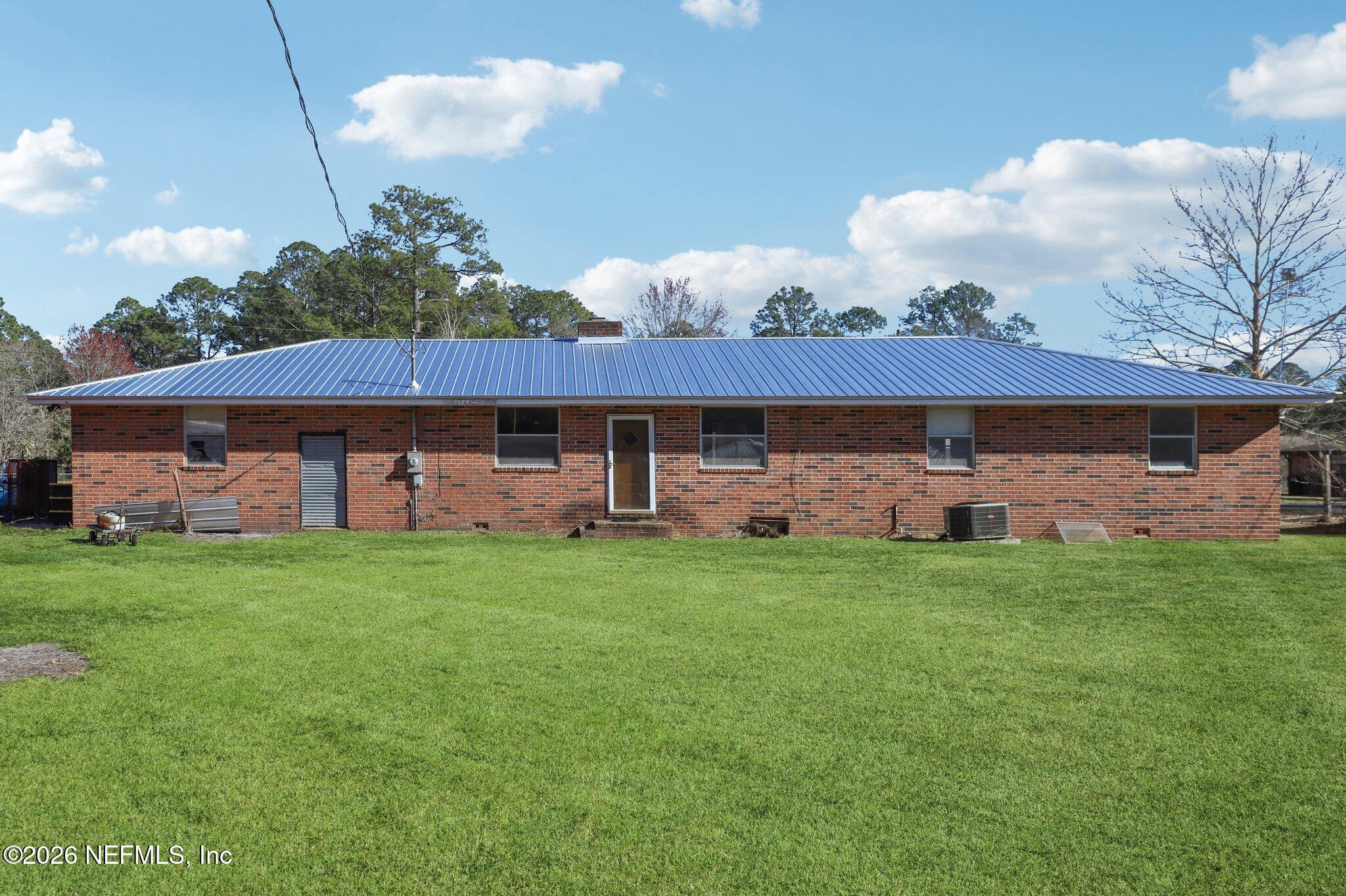 54031 Sheffield Road Callahan, FL 32011 - Photo 33 of 56 a view of a house with backyard
