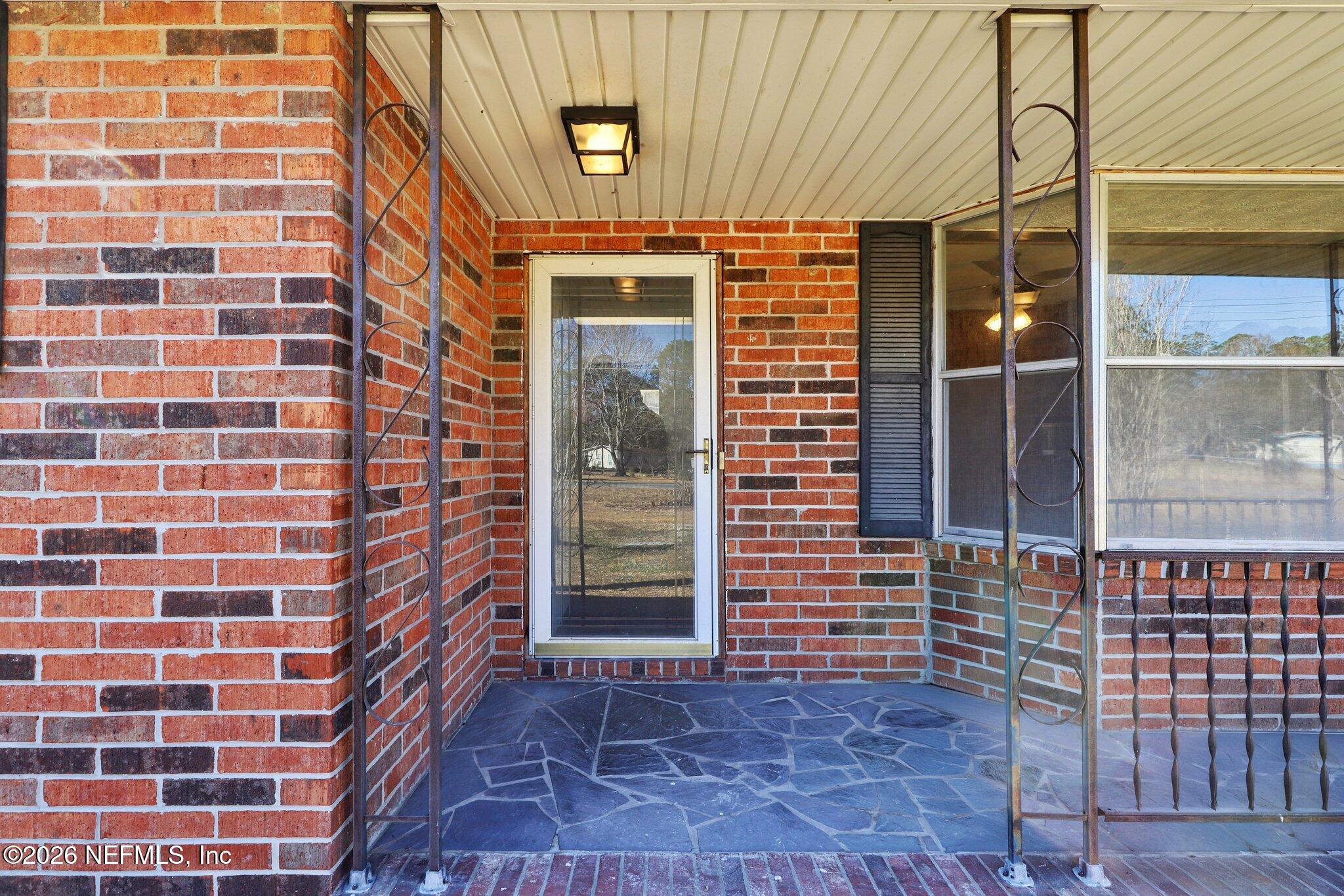54031 Sheffield Road Callahan, FL 32011 - Photo 7 of 59 a view of a brick building