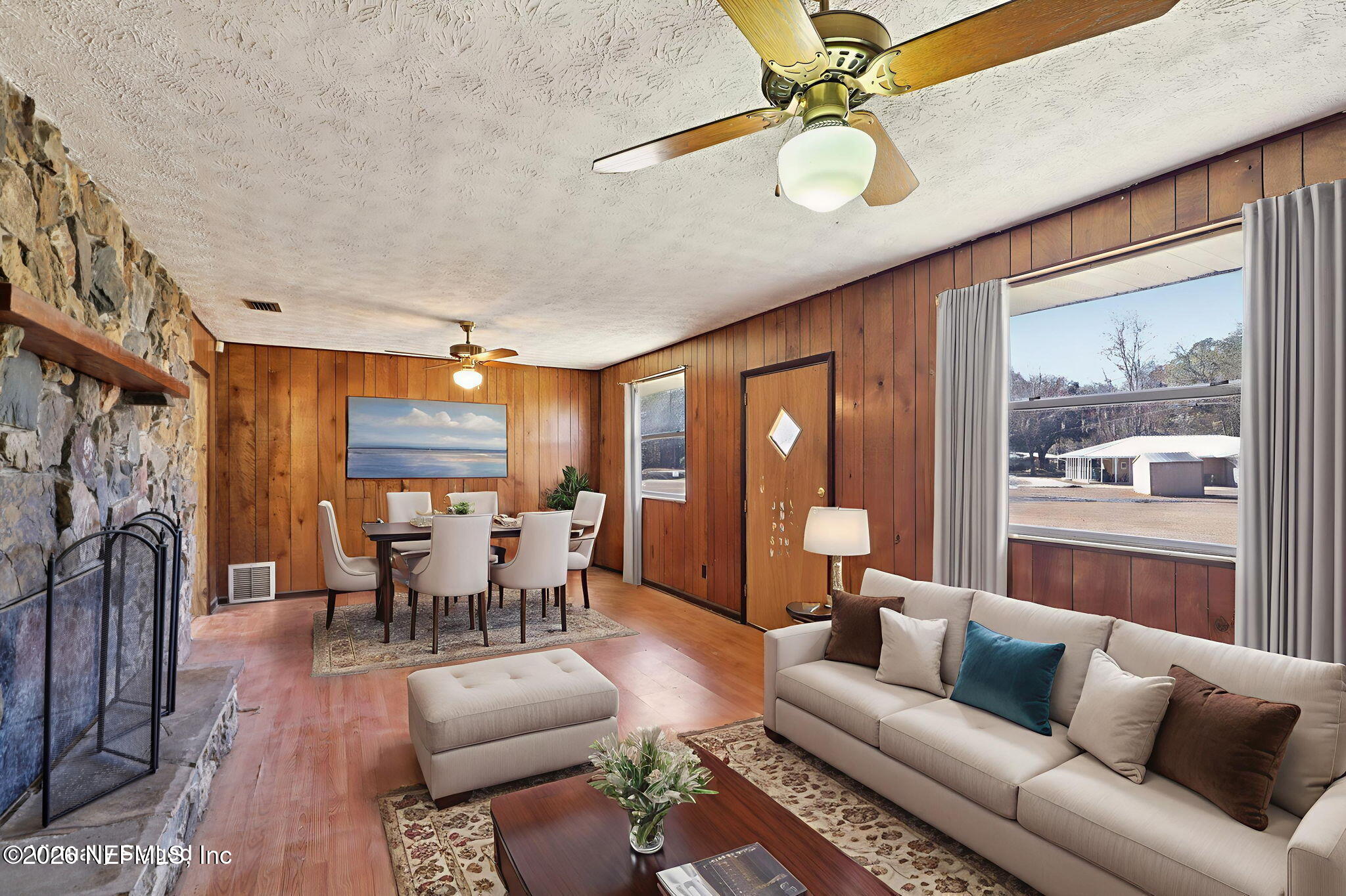 54031 Sheffield Road Callahan, FL 32011 - Photo 9 of 59 a living room with furniture and a large window