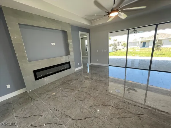 a view of an empty room and window