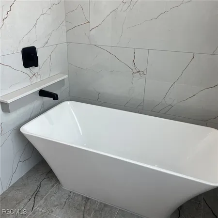 a bathroom with a bathtub
