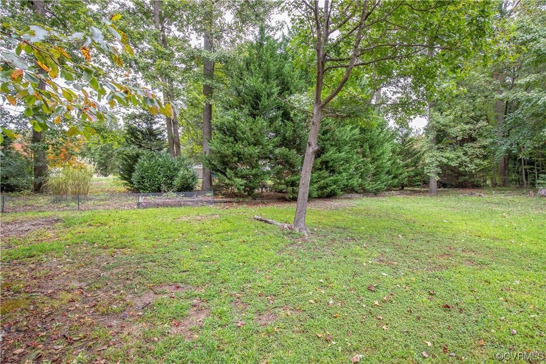 4230 Gayle Road Chester, VA 23831 - Photo 4 of 28 a view of a garden with trees