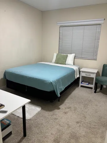 an empty room that has a window