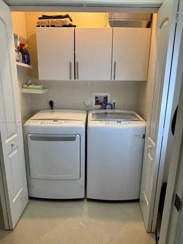 a utility room with washer and dryer