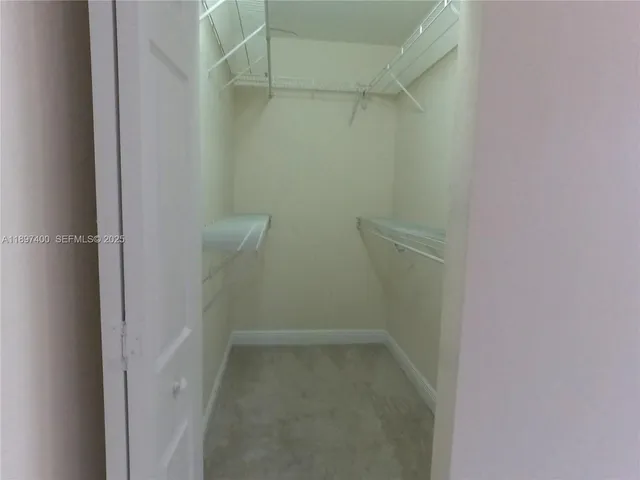 a utility room with washer and dryer