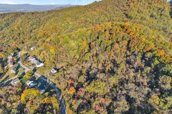a view of a field with an outdoor space