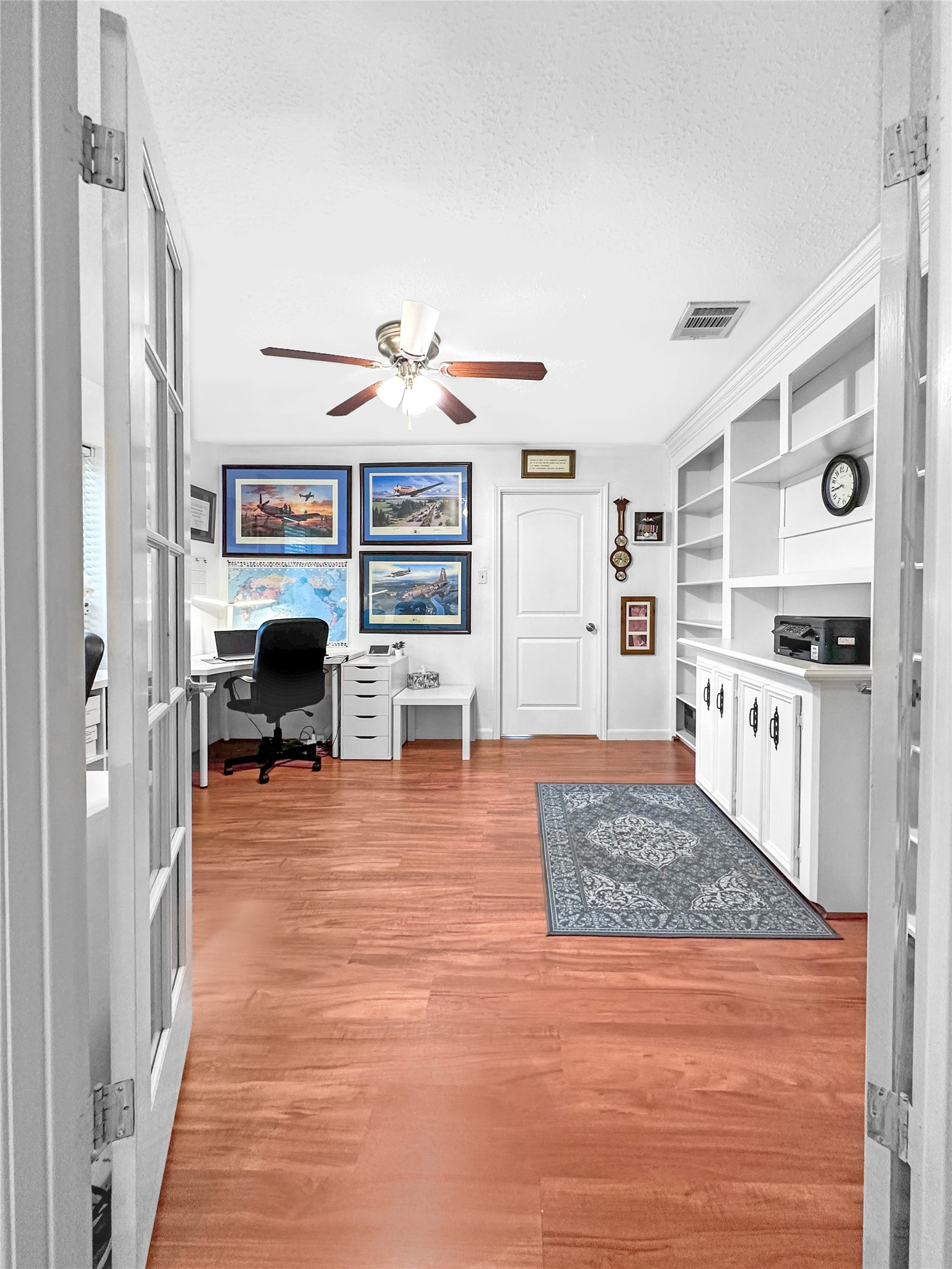 6511 Castle Pine Lane Spring, TX 77379 - Photo 11 of 49 Private home office ideally positioned just off the front entry, offering a convenient and functional workspace with easy access to the nearby primary bedroom through an adjoining door.