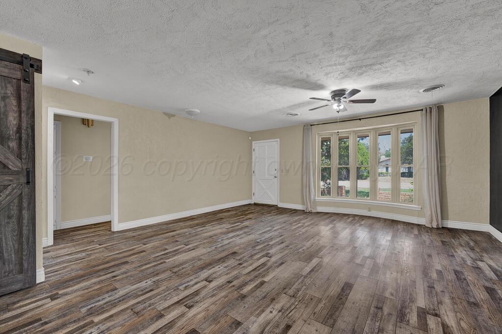 6003 Jameson Road Amarillo, TX 79106 - Photo 6 of 27 living room 2