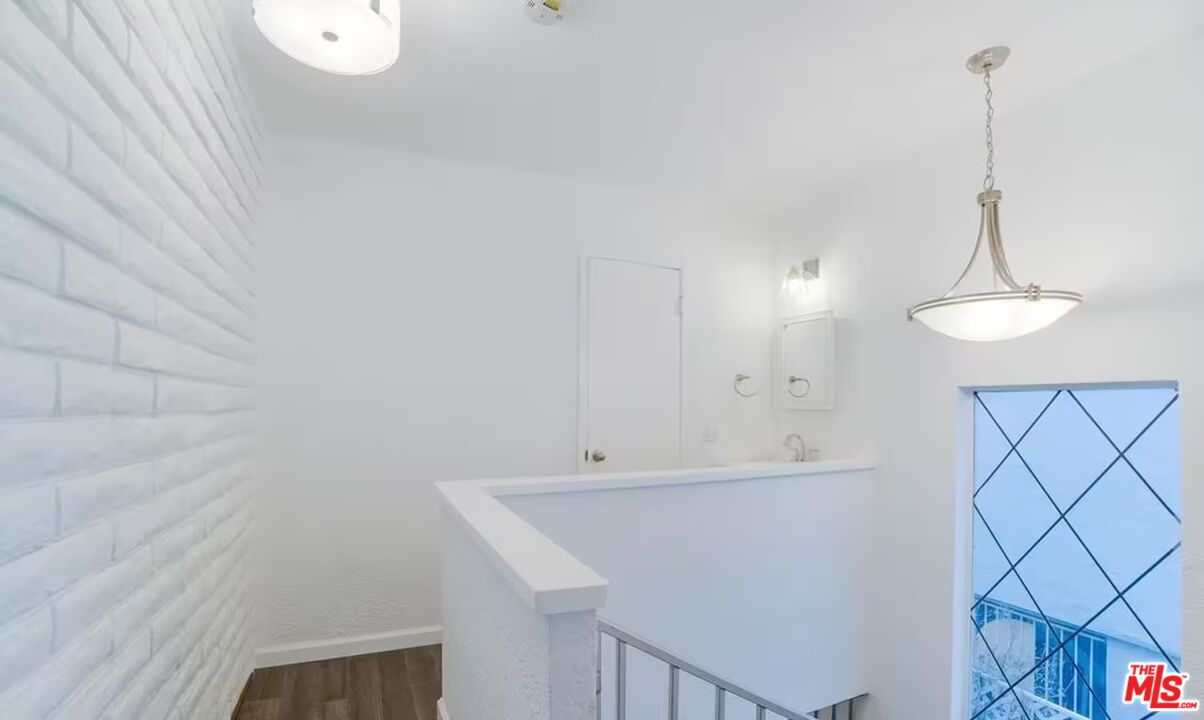 16 Reef Street Marina del Rey, CA 90292 - Photo 11 of 21 a view of a room that has a sink and a mirror