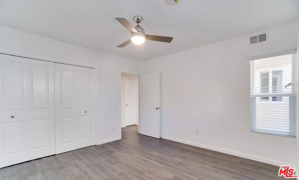 16 Reef Street Marina del Rey, CA 90292 - Photo 14 of 21 a view of an empty room with wooden floor and a window