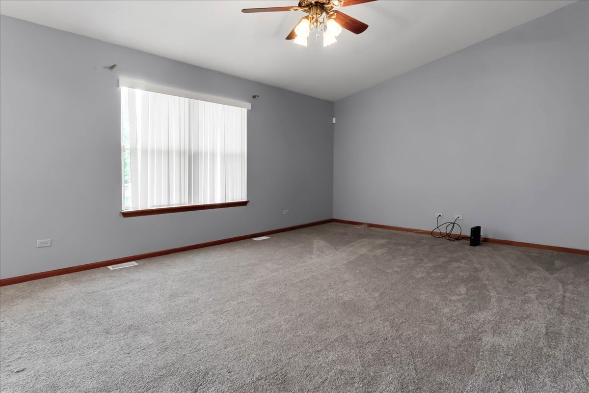 2029 Ridgemoor Drive Plainfield, IL 60586 - Photo 14 of 30 an empty room with a window