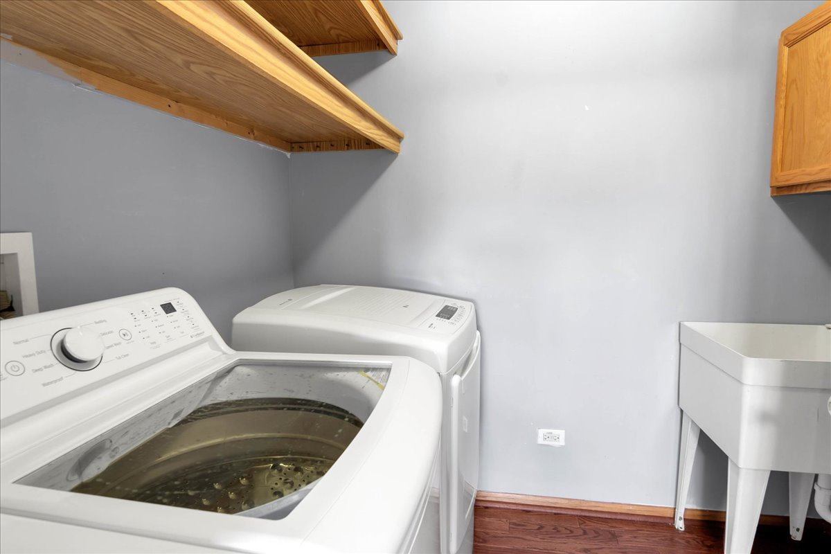 2029 Ridgemoor Drive Plainfield, IL 60586 - Photo 23 of 30 a utility room with dryer and washer