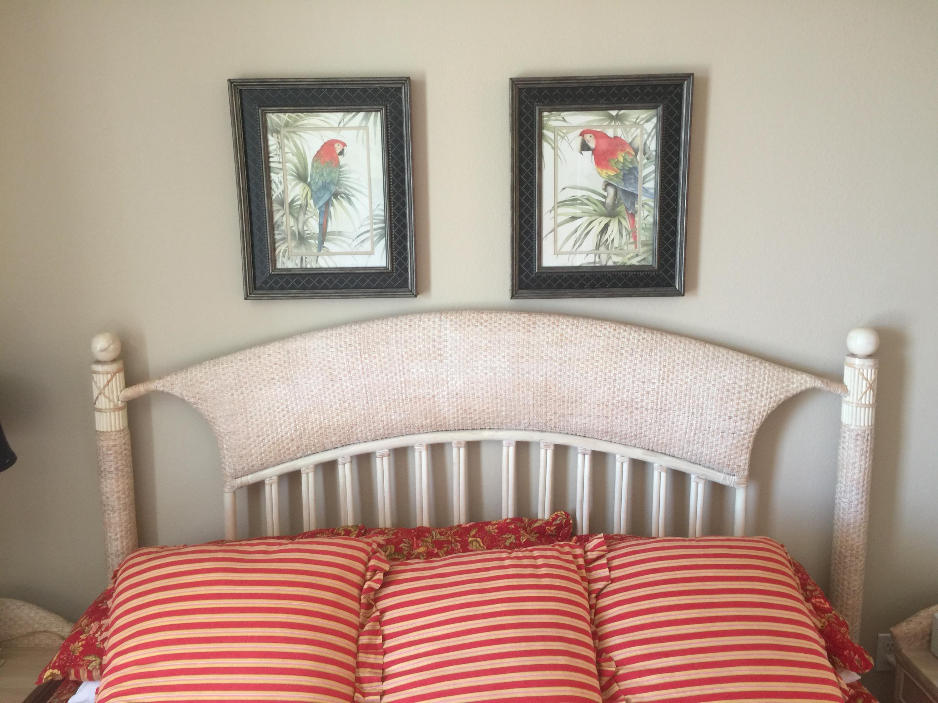 970 Highway 98, Unit 305 Destin, FL 32541 - Photo 16 of 65 a bedroom with a bed and a painting on the wall