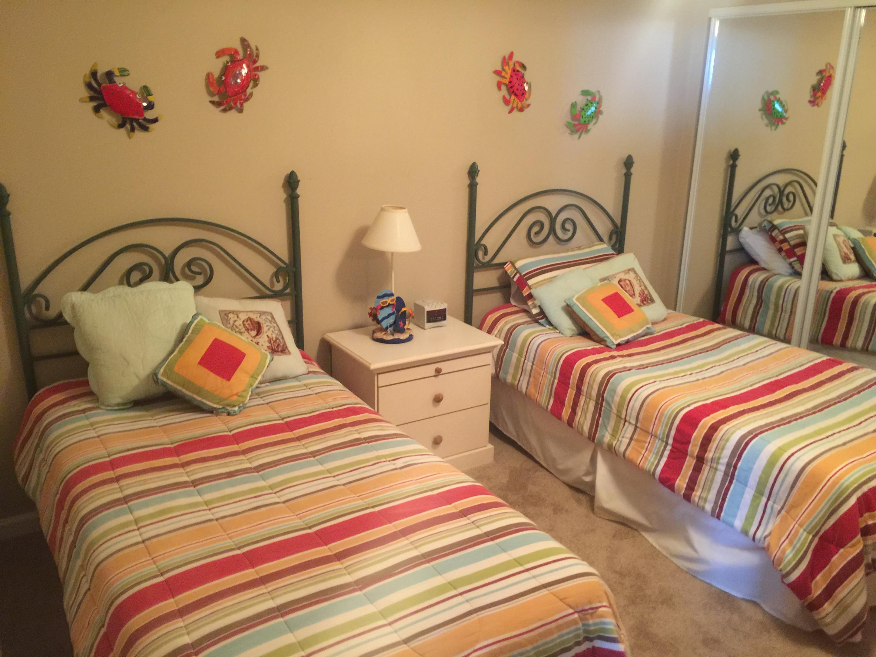 970 Highway 98, Unit 305 Destin, FL 32541 - Photo 23 of 65 a bedroom with two bed and a area