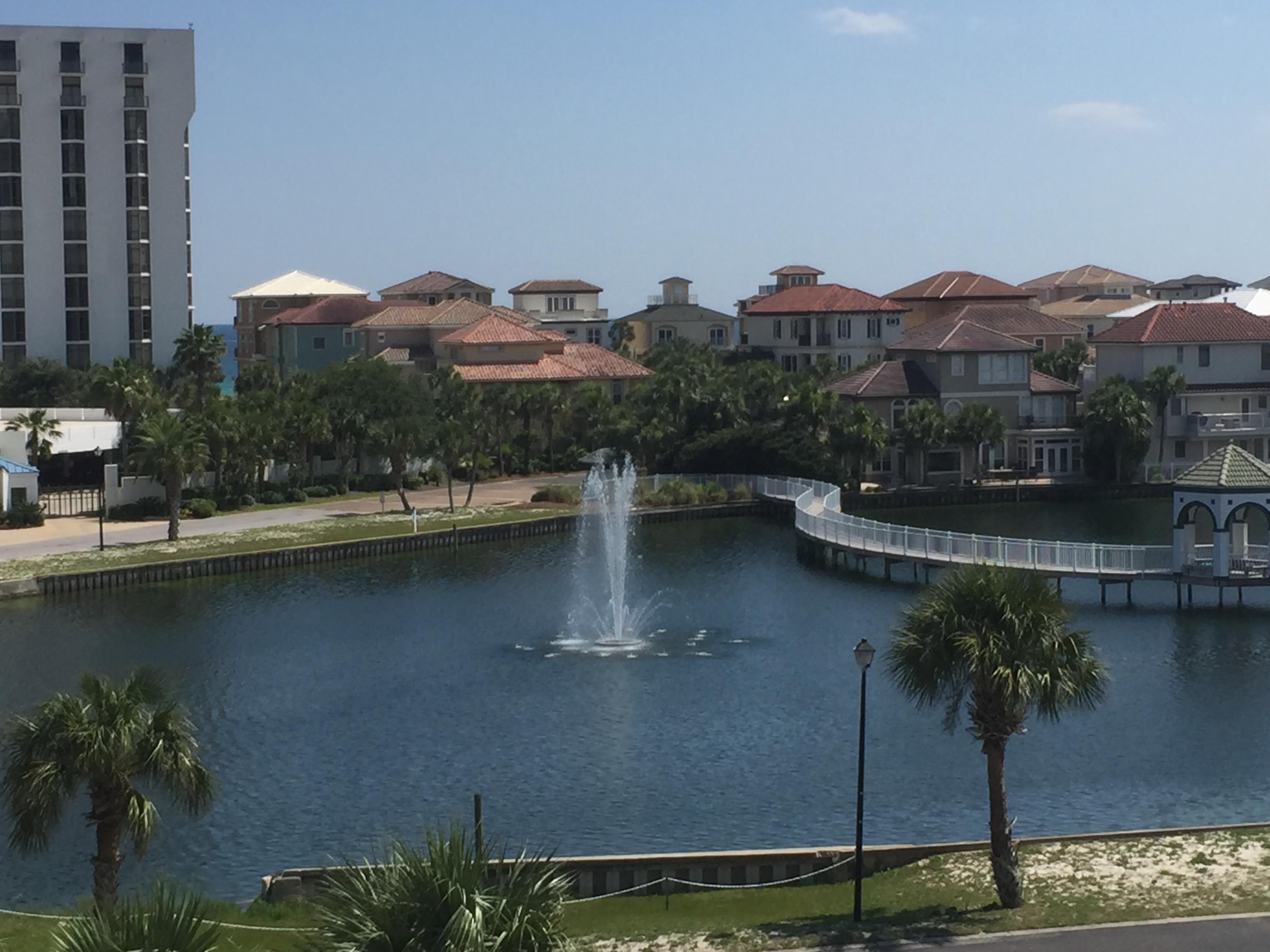 970 Highway 98, Unit 305 Destin, FL 32541 - Photo 56 of 65 a view of a lake with a mountain