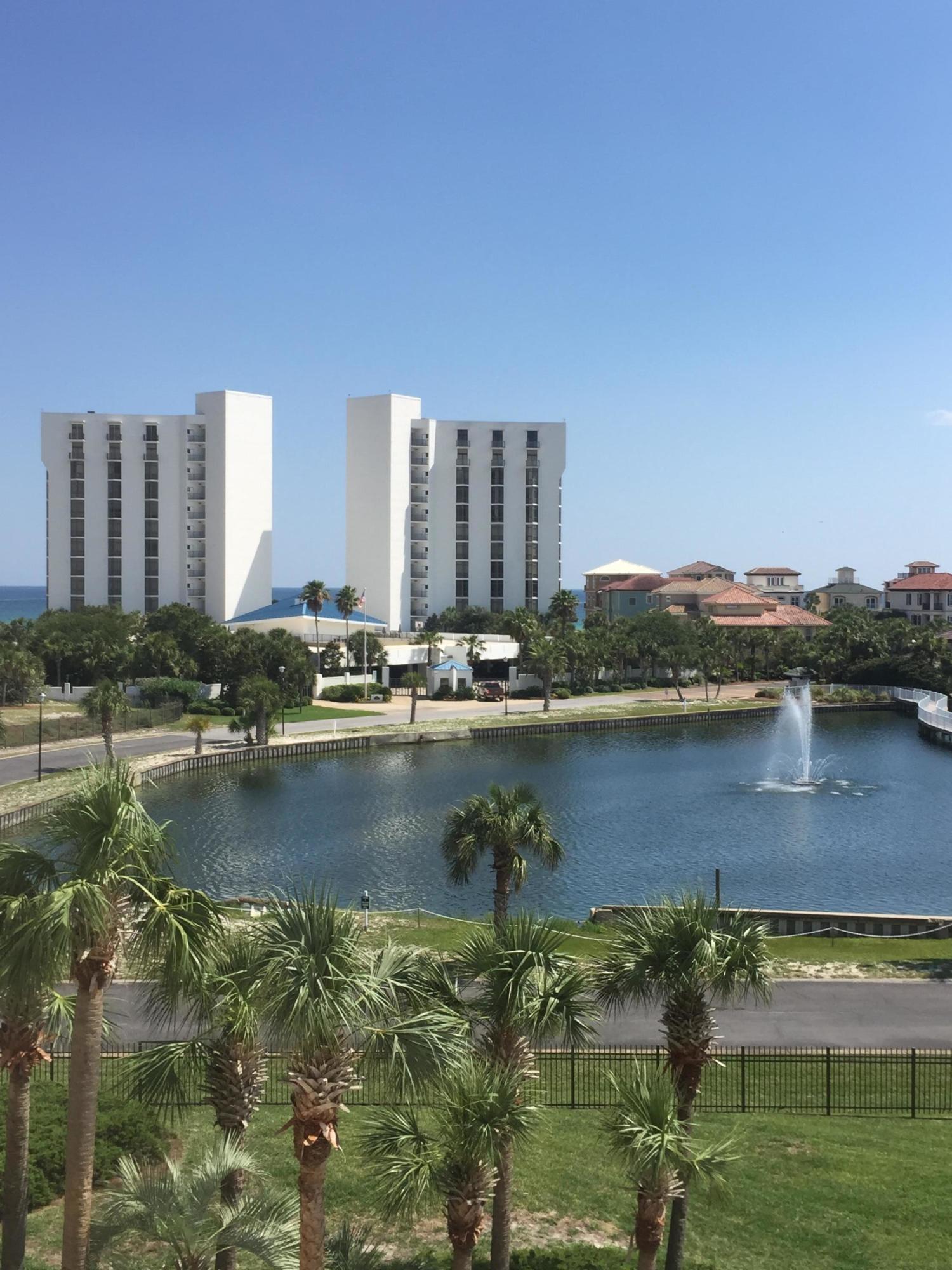 970 Highway 98, Unit 305 Destin, FL 32541 - Photo 60 of 65 a view of residential houses with outdoor space and lake view