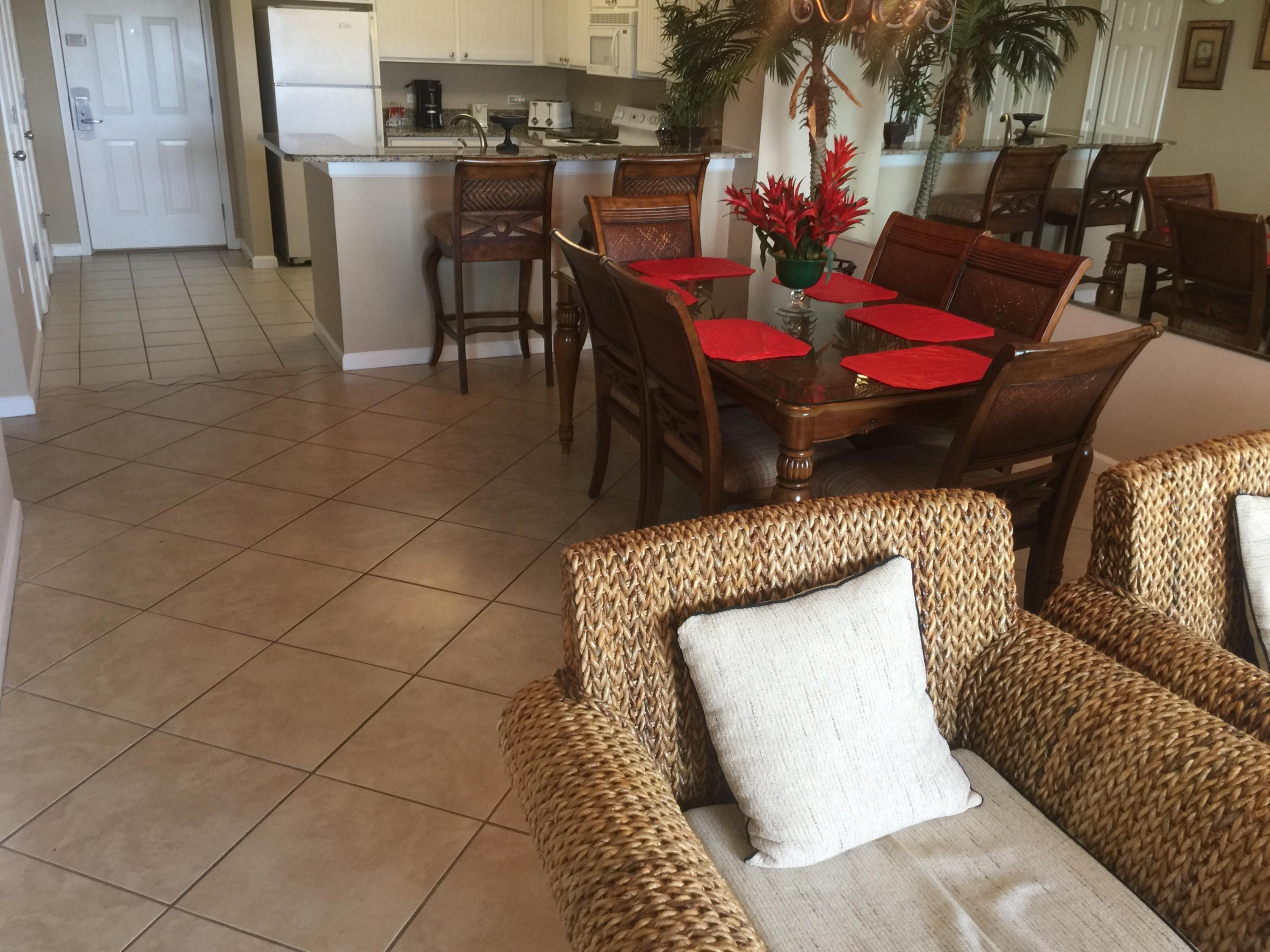 970 Highway 98, Unit 305 Destin, FL 32541 - Photo 10 of 65 a view of a dining room with furniture