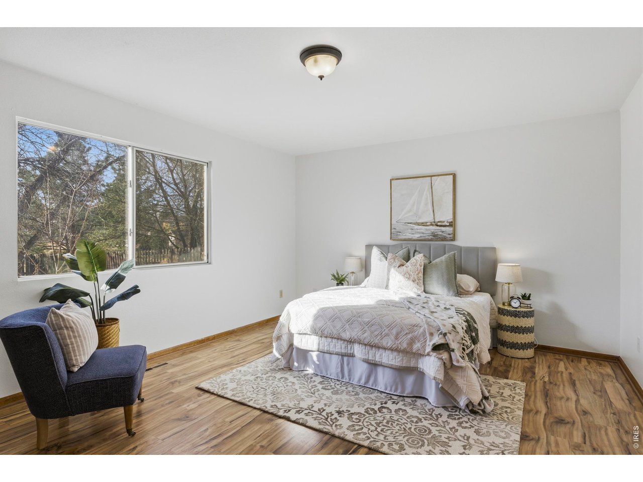 2943 Pleasant Valley Road Fort Collins, CO 80521 - Photo 16 of 38 a bedroom with a bed and window
