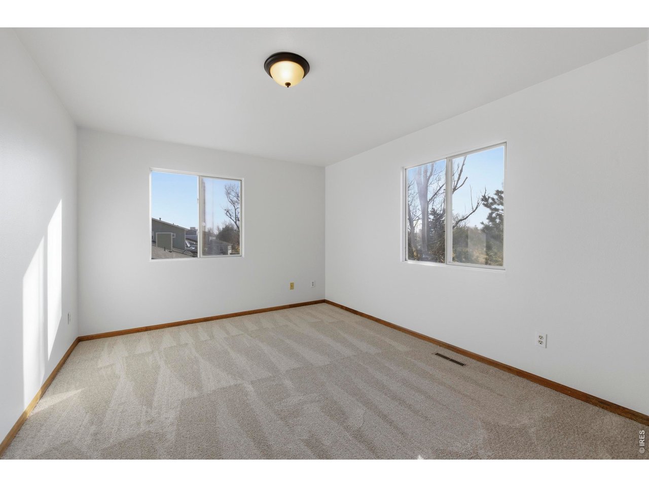 2943 Pleasant Valley Road Fort Collins, CO 80521 - Photo 18 of 38 a view of an empty room with a window