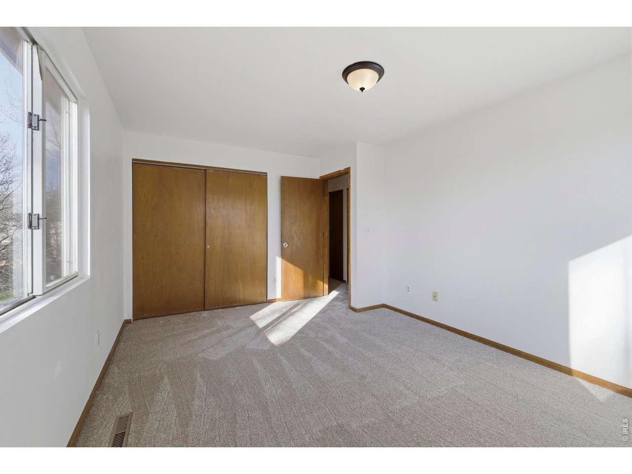2943 Pleasant Valley Road Fort Collins, CO 80521 - Photo 19 of 38 a view of an empty room with a window