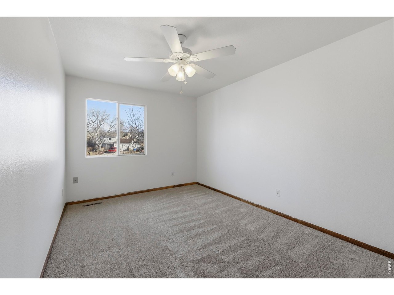 2943 Pleasant Valley Road Fort Collins, CO 80521 - Photo 21 of 38 a view of an empty room with a window