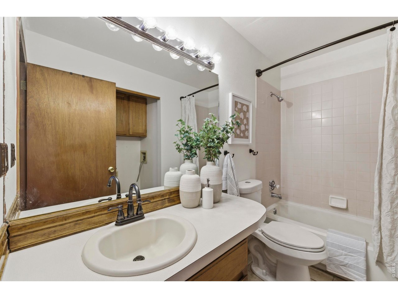 2943 Pleasant Valley Road Fort Collins, CO 80521 - Photo 22 of 38 a bathroom with a sink toilet and shower