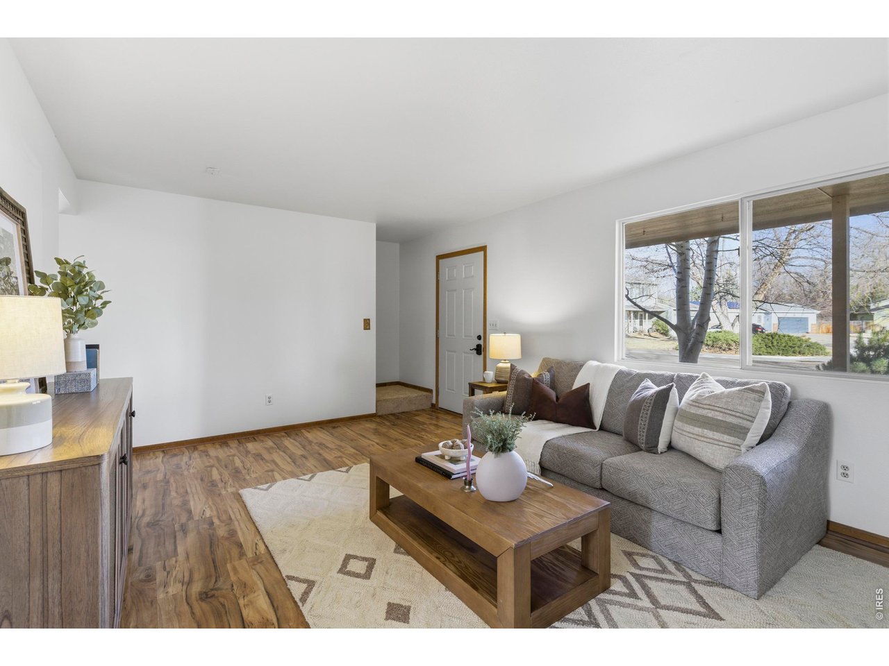 2943 Pleasant Valley Road Fort Collins, CO 80521 - Photo 6 of 38 a living room with furniture and a large window