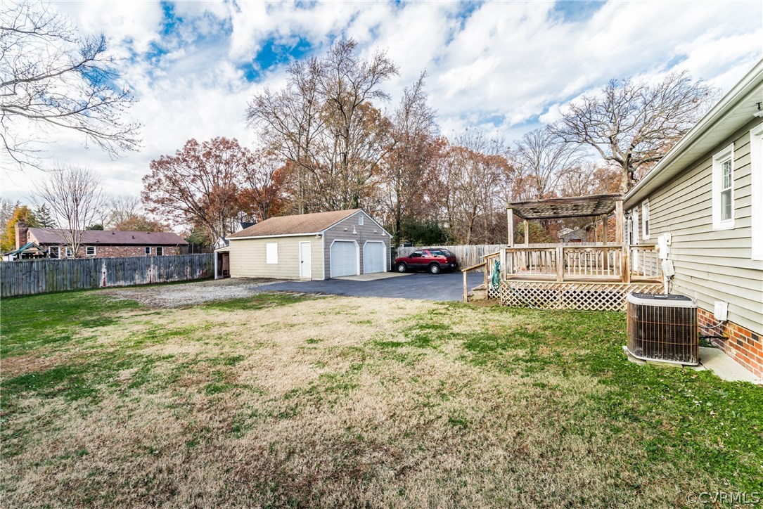 11912 Gardengate Road Midlothian, VA 23112 - Photo 50 of 50 a front view of a house with a yard and garage