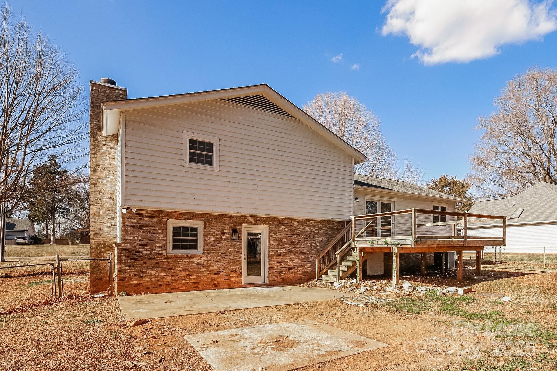 167 Mooreland Road Mooresville, NC 28117 - Photo 13 of 18 a view of a house with a patio