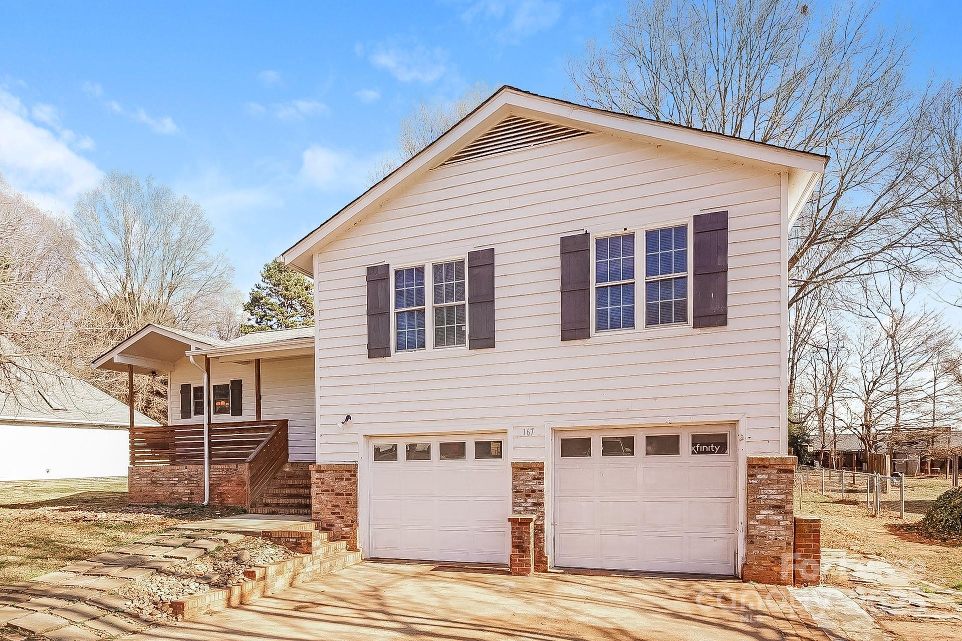 167 Mooreland Road Mooresville, NC 28117 - Photo 2 of 18 a view of a house with a yard