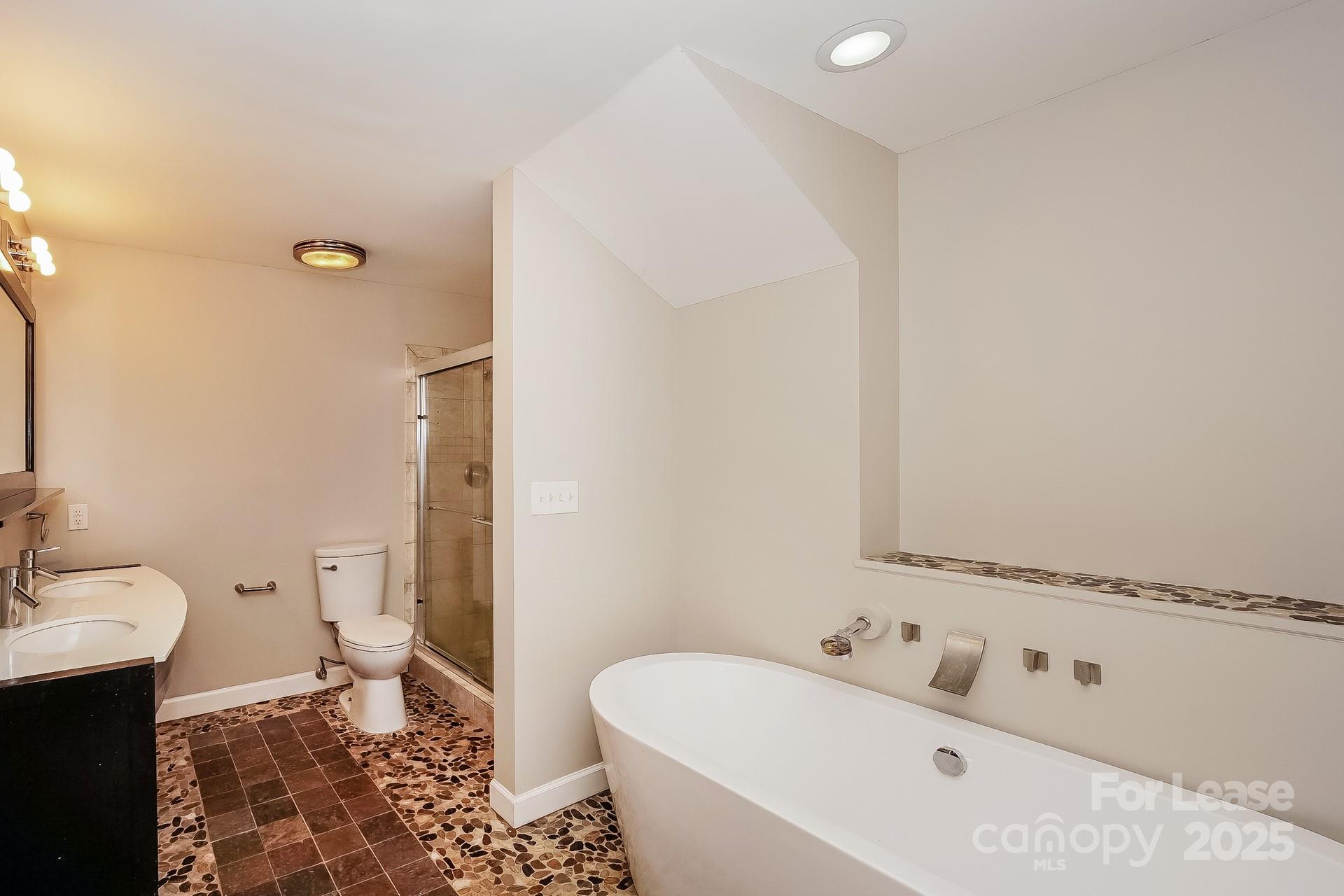 167 Mooreland Road Mooresville, NC 28117 - Photo 10 of 18 a bathroom with a sink and a toilet