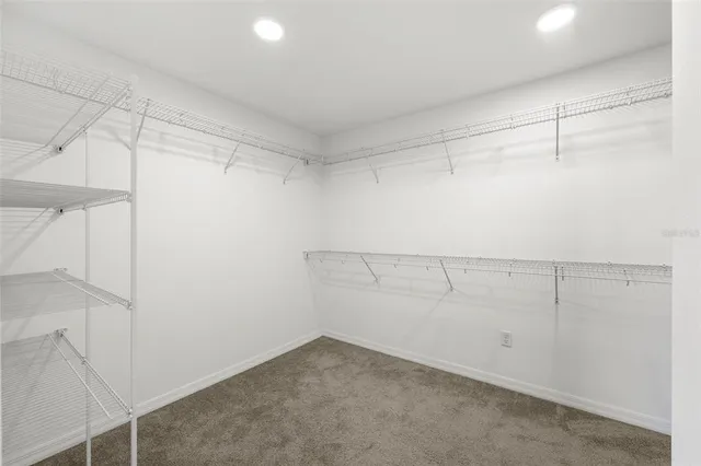 a view of a room with racks on the wall