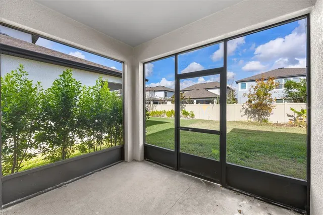 a view of a large window with an outdoor space