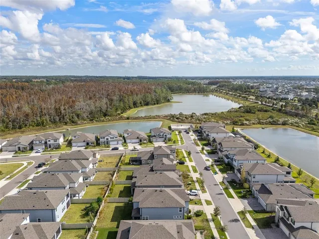 a view of a city with an ocean view