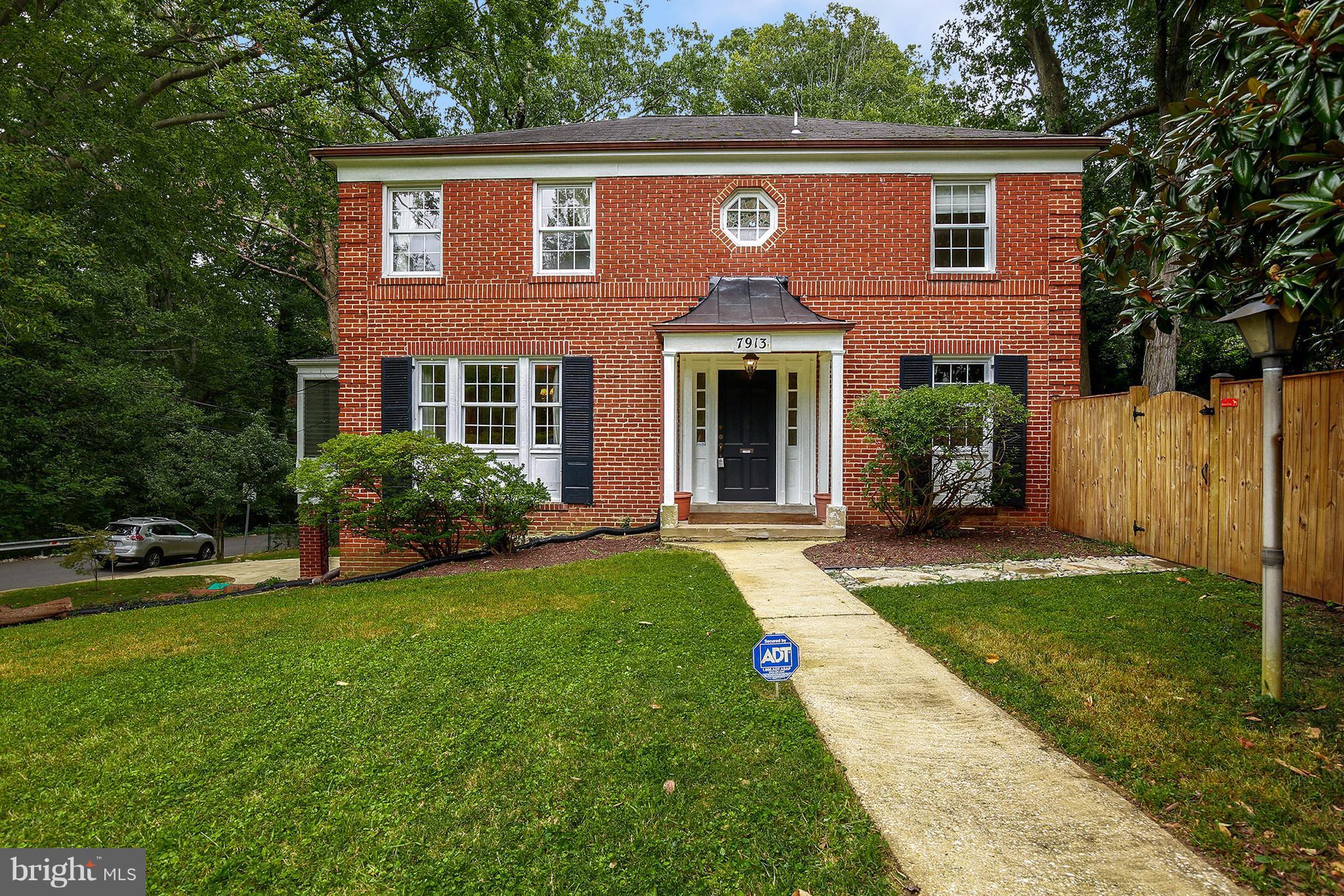 7913 Piney Branch Road Silver Spring, MD 20910 - Photo 2 of 30 a front view of a house with yard