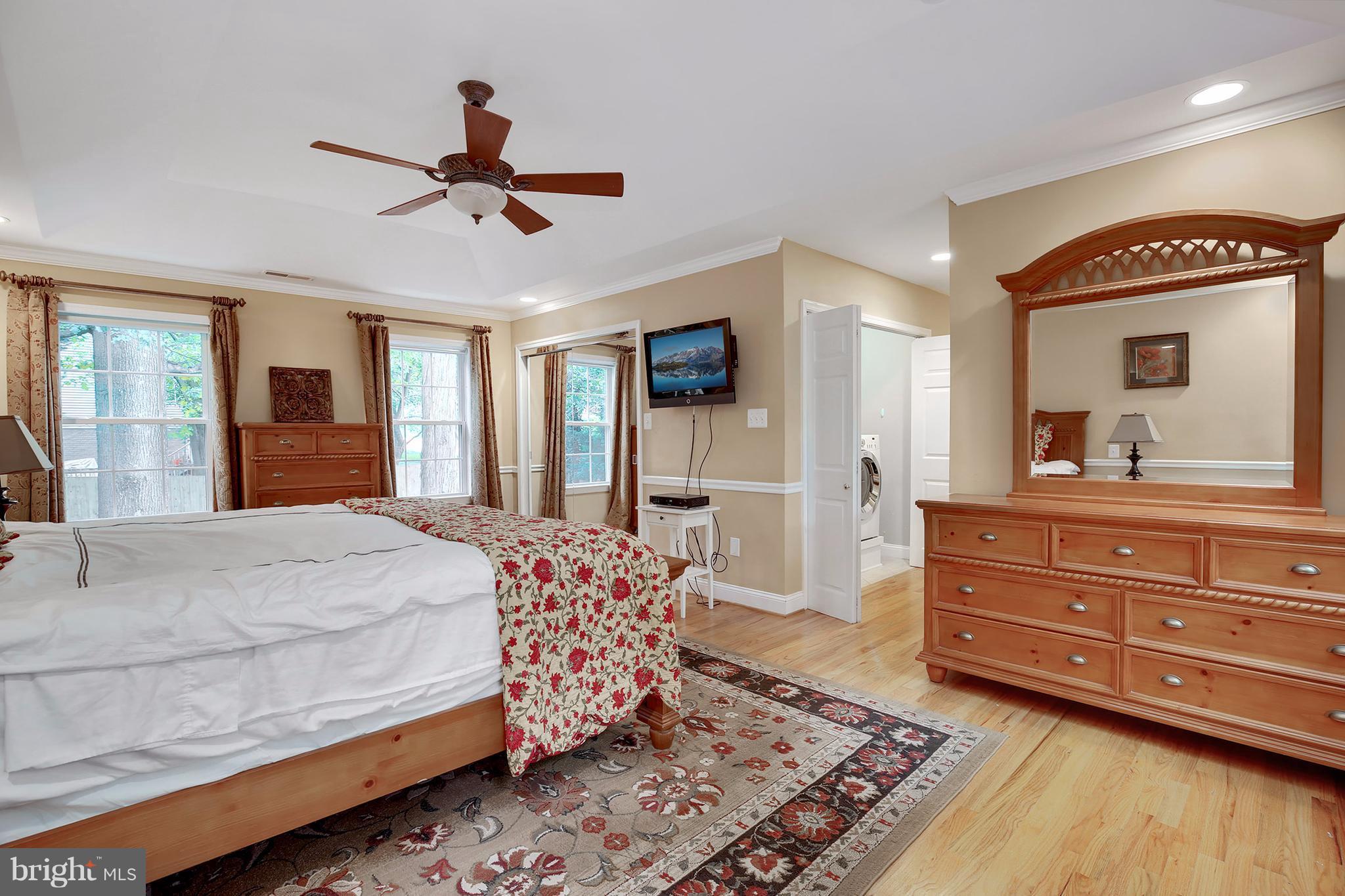 7913 Piney Branch Road Silver Spring, MD 20910 - Photo 24 of 30 a bedroom with a bed and a dresser