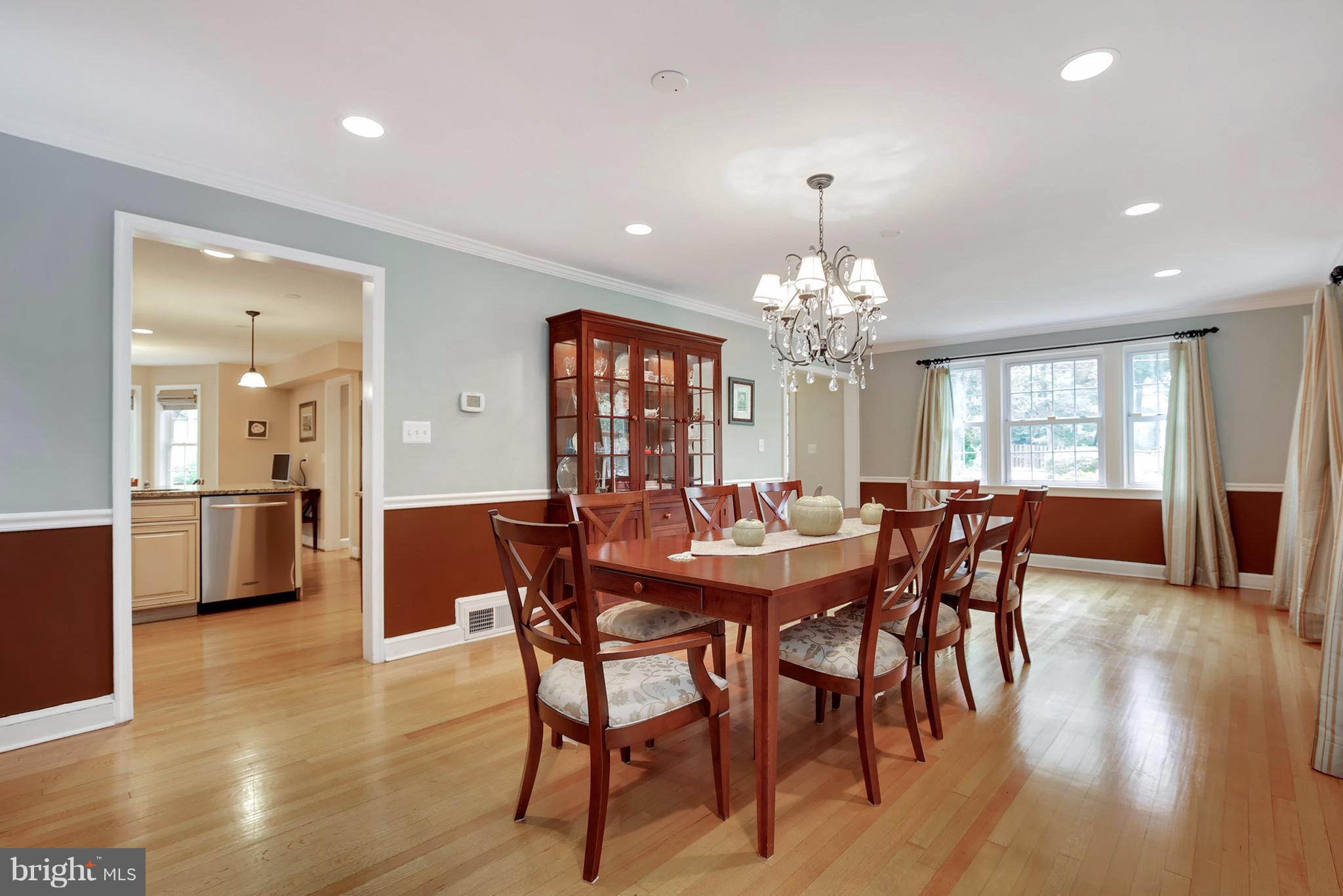 7913 Piney Branch Road Silver Spring, MD 20910 - Photo 6 of 30 a dining room with furniture window and wooden floor