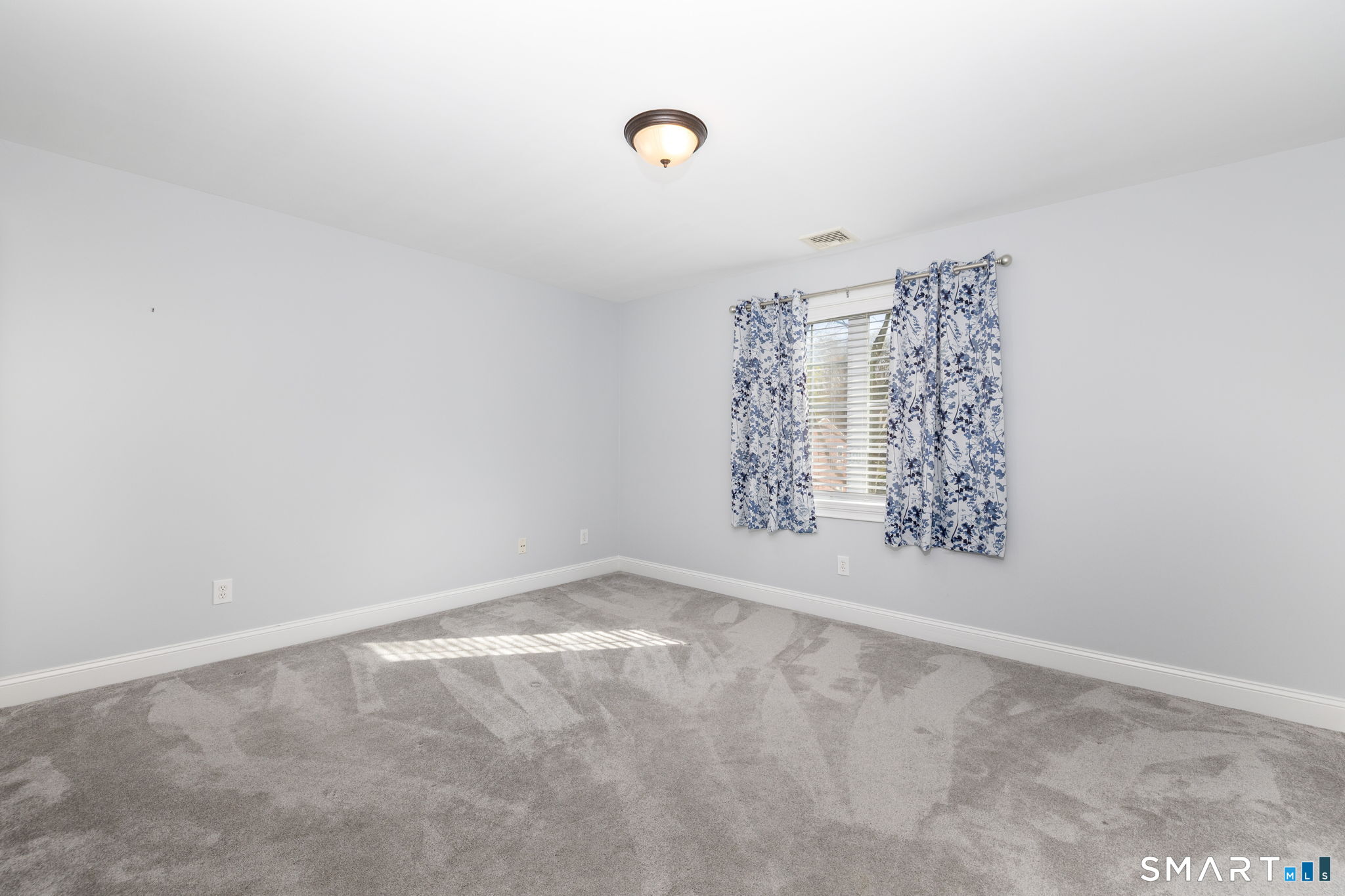 66 Kristyn Circle, Unit 66 Manchester, CT 06042 - Photo 16 of 26 a view of a hallway with chandelier fan