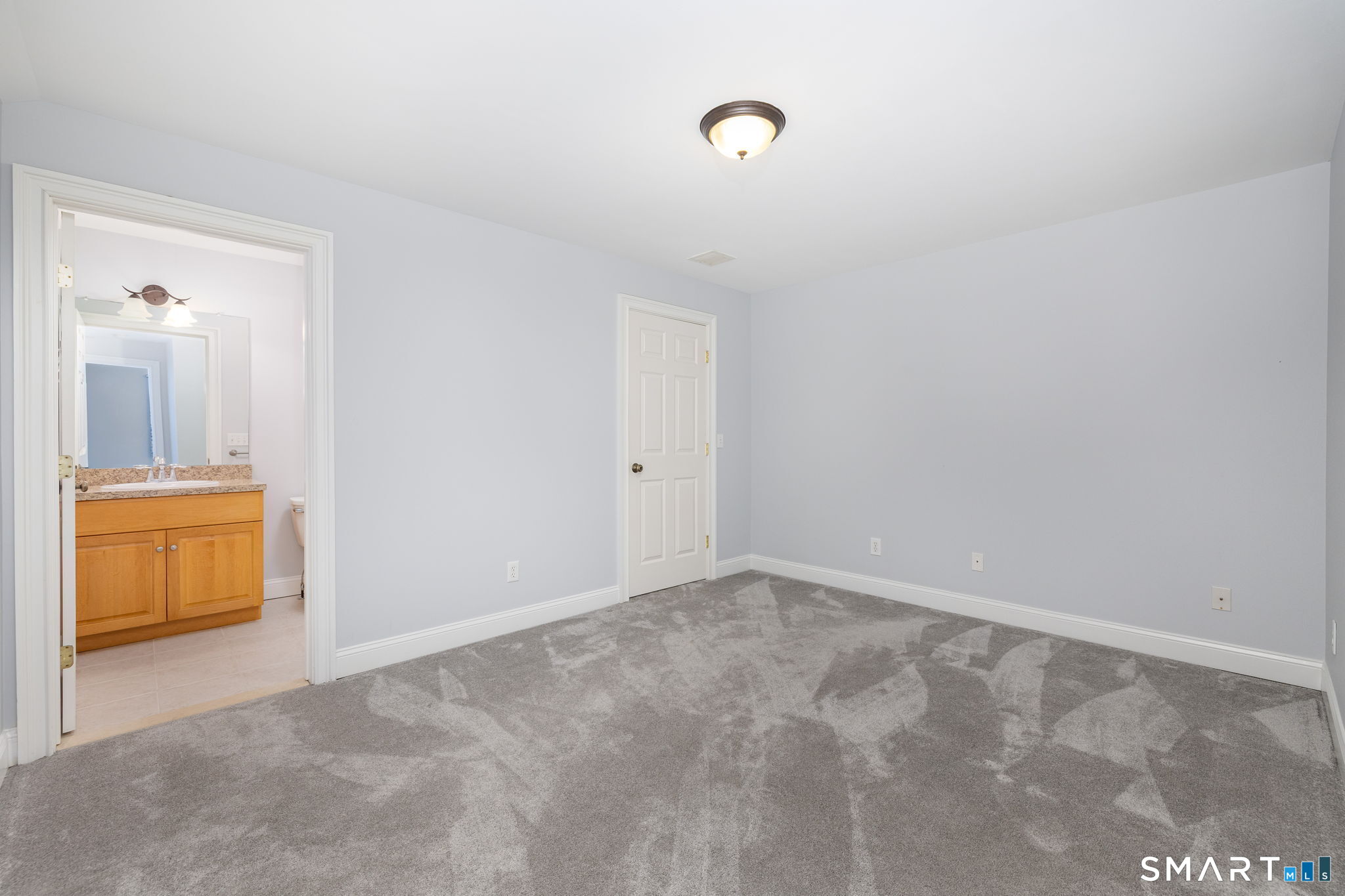 66 Kristyn Circle, Unit 66 Manchester, CT 06042 - Photo 19 of 26 a view of a room with a sink and cabinet