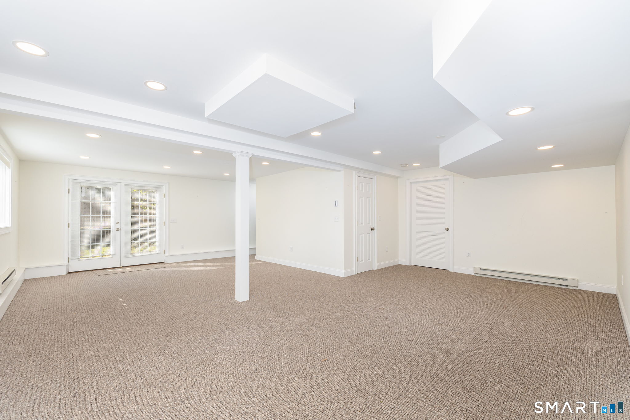 66 Kristyn Circle, Unit 66 Manchester, CT 06042 - Photo 21 of 26 an empty room with windows