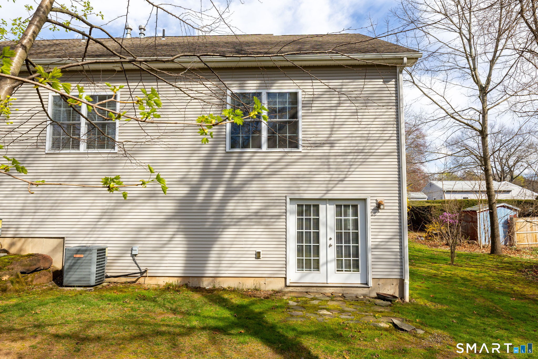 66 Kristyn Circle, Unit 66 Manchester, CT 06042 - Photo 23 of 26 a front view of a house with a yard