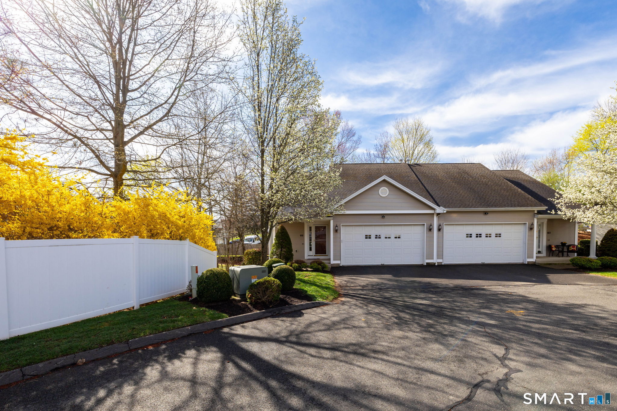 66 Kristyn Circle, Unit 66 Manchester, CT 06042 - Photo 25 of 26 a front view of a house with a garden