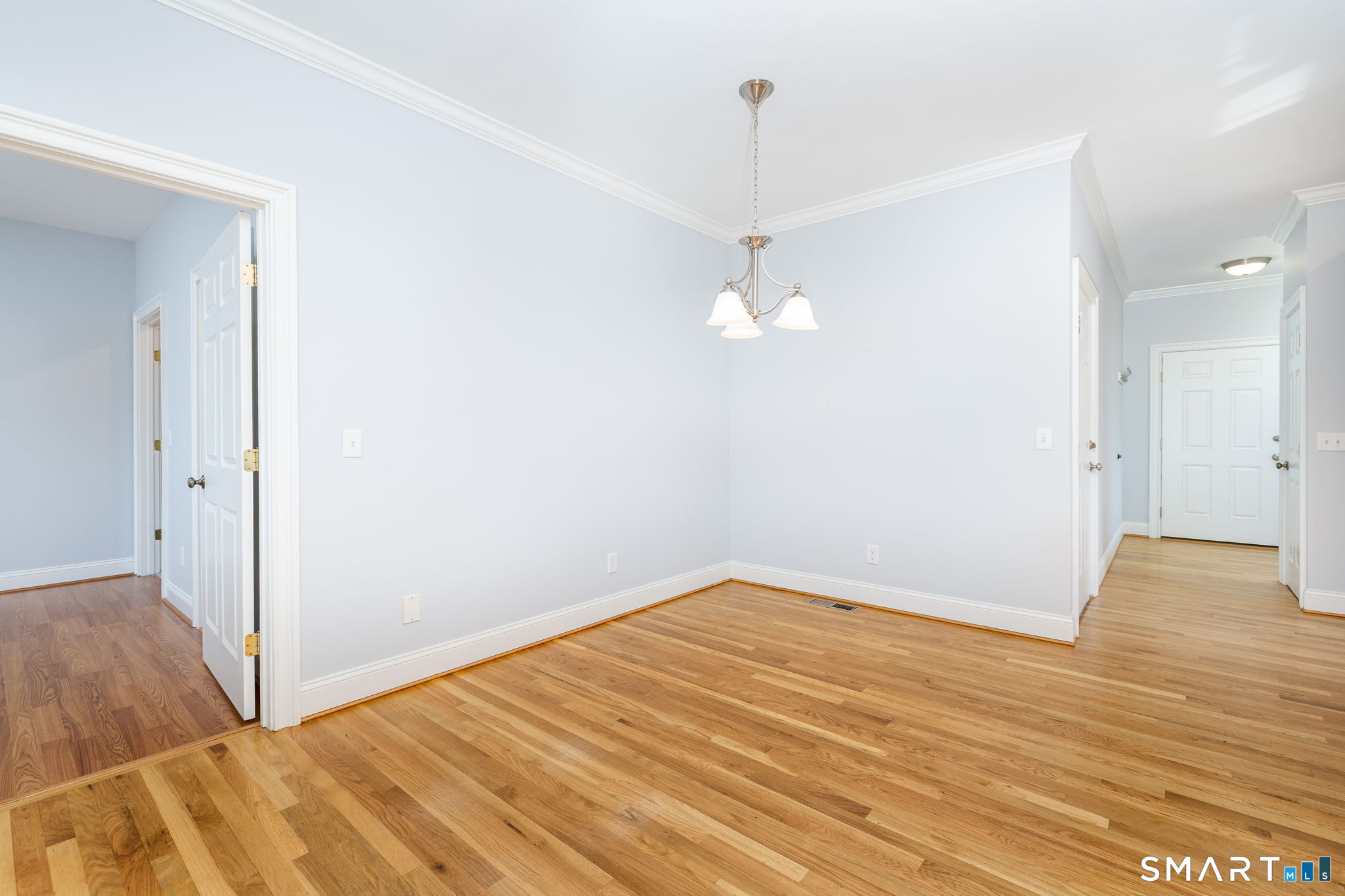 66 Kristyn Circle, Unit 66 Manchester, CT 06042 - Photo 10 of 26 a view of empty room with wooden floor