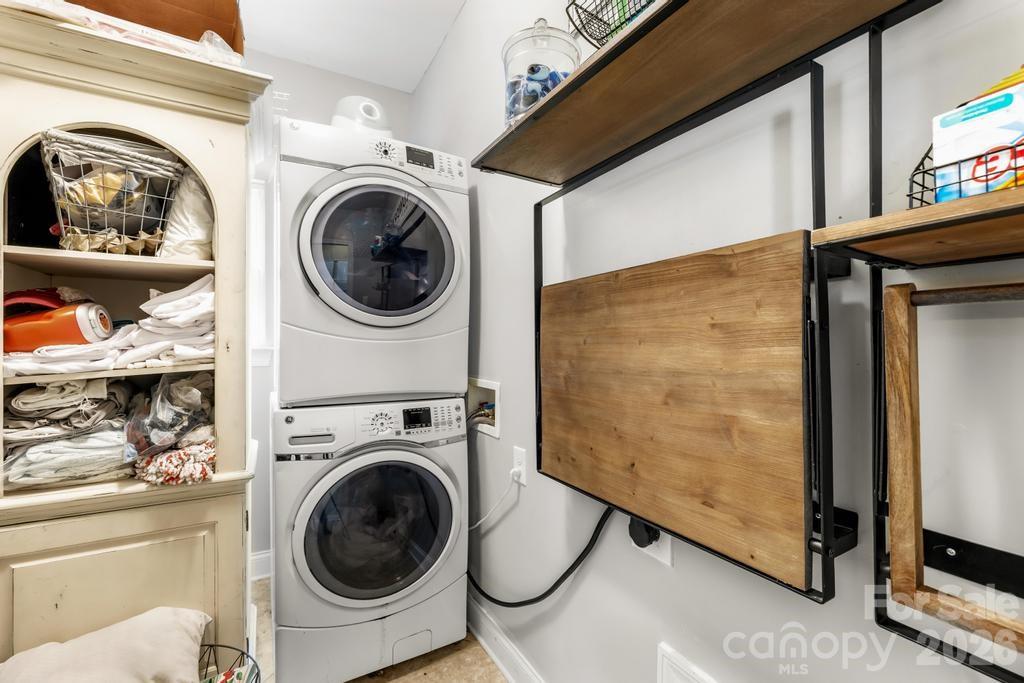 1007 Hamil Ridge Drive Waxhaw, NC 28173 - Photo 28 of 44 a utility room with dryer and washer