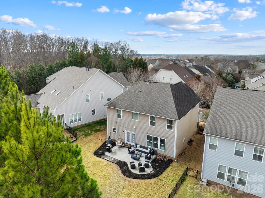 1007 Hamil Ridge Drive Waxhaw, NC 28173 - Photo 8 of 44 an aerial view of a house with garden space and ocean view