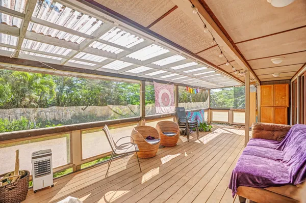 a living room with large windows